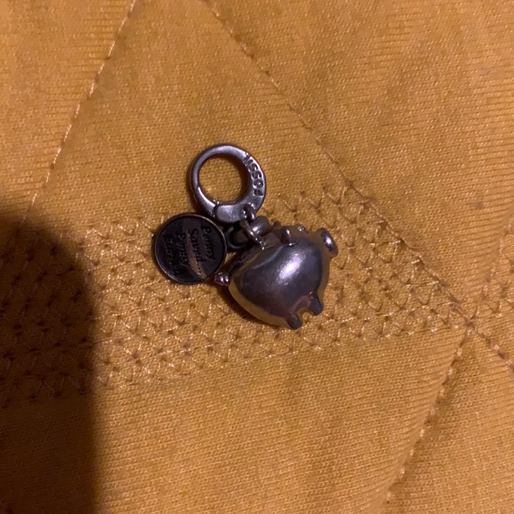 Fossil piggy bank charm